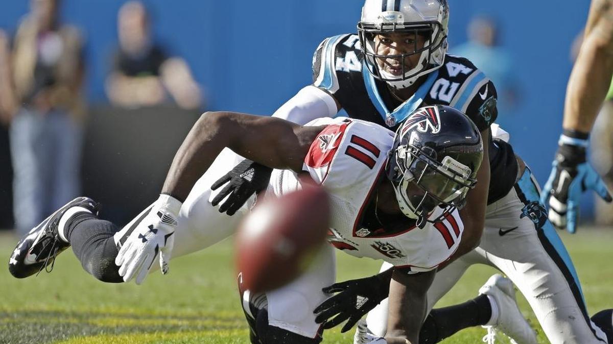 Atlanta Falcons wide receiver Julio Jones (11) was held in check two weeks ago by Carolina Panthers cornerback Josh Norman (24). Round 2 is Sunday.