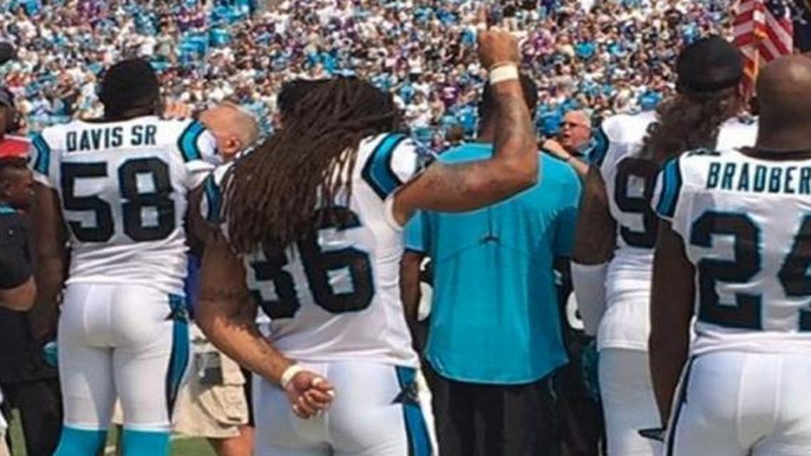 As seen on his Instagram page, Carolina Panthers safety Marcus Ball raises his right hand high in a fist with his index finger raised during the National Anthem before Sunday’s game against the Minnesota Vikings.