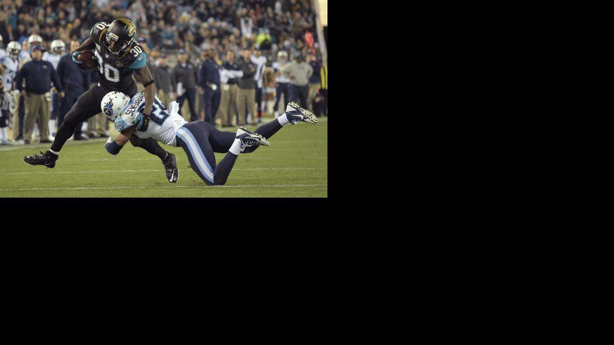 
Running back Jordan Todman was signed to a one-year contract by the Carolina Panthers on Monday. Todman spent three seasons with the Jacksonville Jaguars, and in 2014 ran 32 times for 186 yards and caught 25 passes for 198 yards and a touchdown. He also was the Jaguars’ primary kickoff returner.
