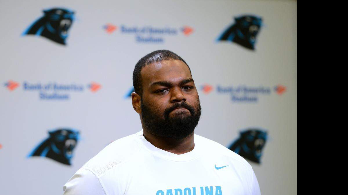 
Carolina Panthers left offensive tackle Michael Oher listens to a reporter's question on Monday, April 20, 2015. The Panthers held a new conference in conjunction with the beginning of their off season workout program.
