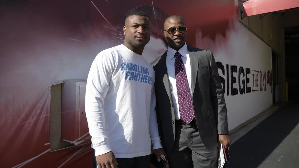 Carolina Panthers defensive back Leonard Johnson and Panthers assistant defensive backs coach Curtis Fuller (right) before a game in Tampa. Fuller has been promoted to defensive backs coach by the team.
