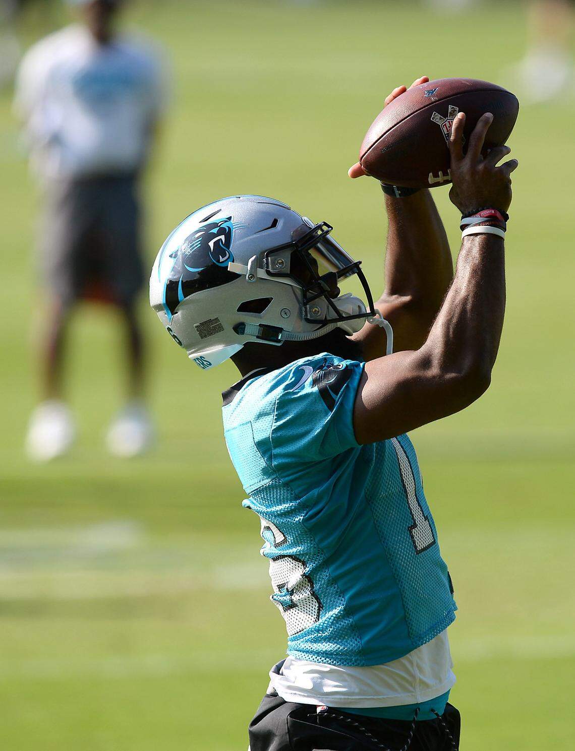 Carolina Panthers wide receiver Rasheed Bailey catches a pass from quarterback Cam Newton during a team OTA practice on Wednesday, June 13, 2018.