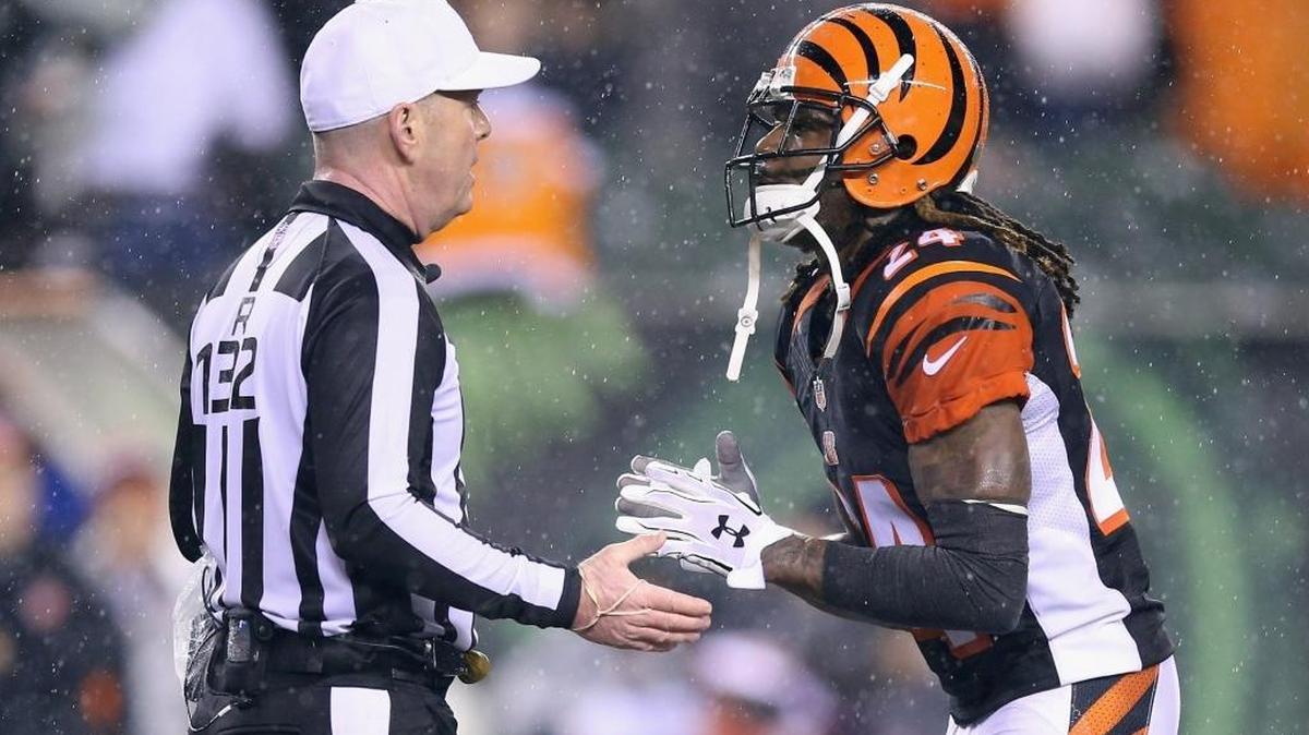 Adam Jones of the Cincinnati Bengals argues a call with referee John Parry in the fourth quarter against the Pittsburgh Steelers during the AFC Wild Card Playoff game at Paul Brown Stadium on Saturday.