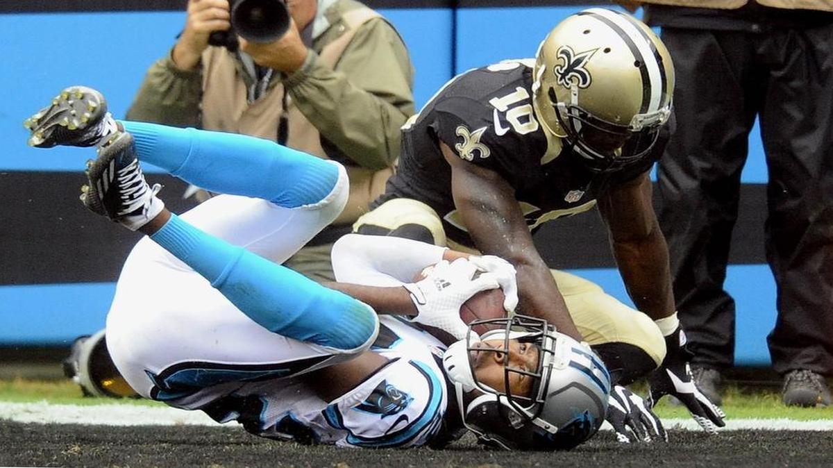 
Carolina Panthers’ Josh Norman (24) intercepts a pass in the end zone intended for New Orleans Saints’ Brandin Cooks (10) late in the game at Bank of America Stadium on Sunday, September 27, 2015. The Panthers won, 27-222
