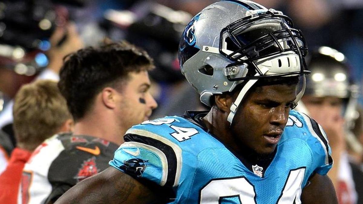 Panthers defensive end Kony Ealy stands on the field after Tampa Bay Buccaneers kicker Roberto Aguayo made the winning field goal Monday. Ealy’s facemask penalty put Aguayo 15 yards closer for his field goal.