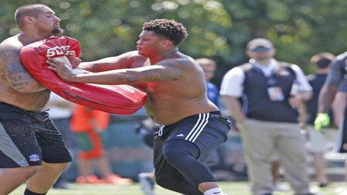 
Miami Hurricanes offensive tackle Ereck Flowers (right) is among the top offensive tackle prospects in the NFL draft, but also one of the most enigmatic. 
