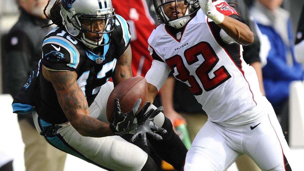 Carolina Panthers wide receiver Kelvin Benjamin (13) misses a pass as Atlanta Falcons cornerback Jalen Collins (32) defends during the first half at Bank of America Stadium on Saturday, December 24, 2016. The Falcons won, 33-16.