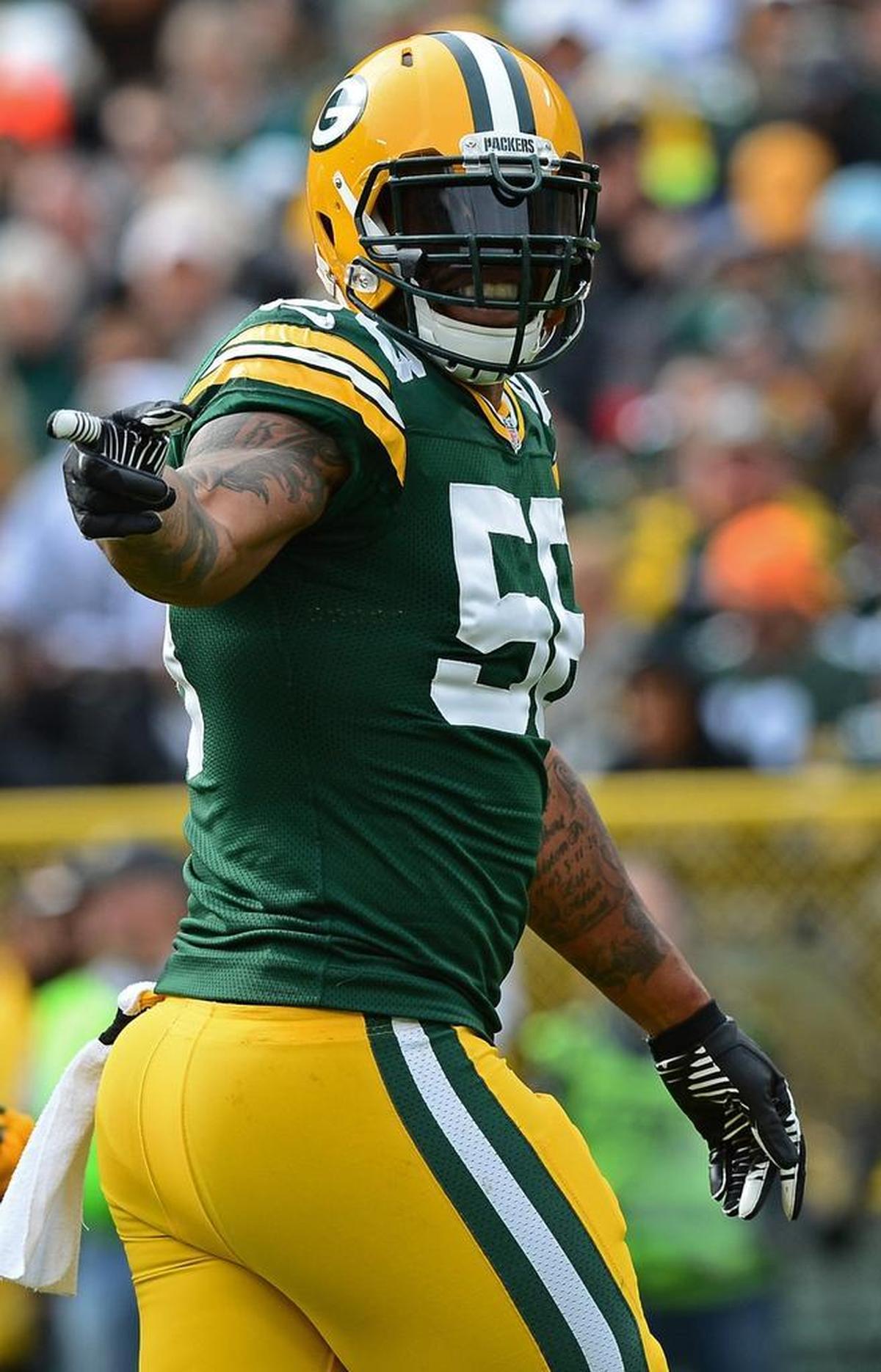 As an outside linebacker in the Green Bay Packers’ 3-4 defense, Julius Peppers (56) had 25 sacks.