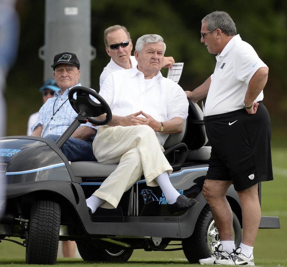 Carolina Panthers' owner Jerry Richardson (center) talked with team general manager Dave Gettleman (right) in 2014 during training camp at Wofford College. Richardson fired Gettleman Monday in a move hardly anyone expected.