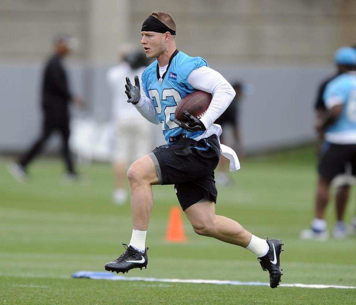 Carolina Panthers running Christian McCaffrey darts upfield during the first session of the team's rookie camp on Friday.