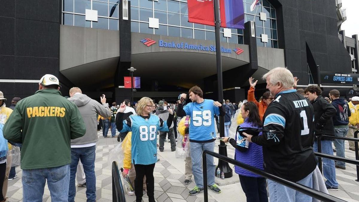Football fans pass through security at Bank of America Stadium earlier this month prior to the game against the Green Bay Packers.