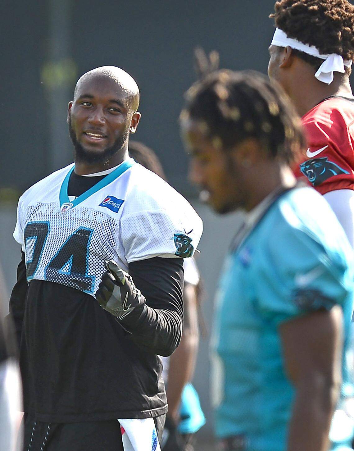 Carolina Panthers cornerback James Bradberry, left, talks with quarterback Cam Newton, right, during stretching at  practice on Thursday, June 14, 2018. Bradberry said he wants to step up as a leader and become more consistent this season.