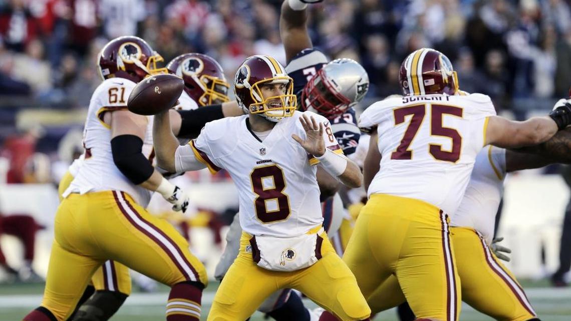 Redskins quarterback Kirk Cousins passes against the Patriots during a Nov. 8 game in Foxborough, Mass. Cousins has kept Washington afloat since Robert Griffin III was benched earlier this season.