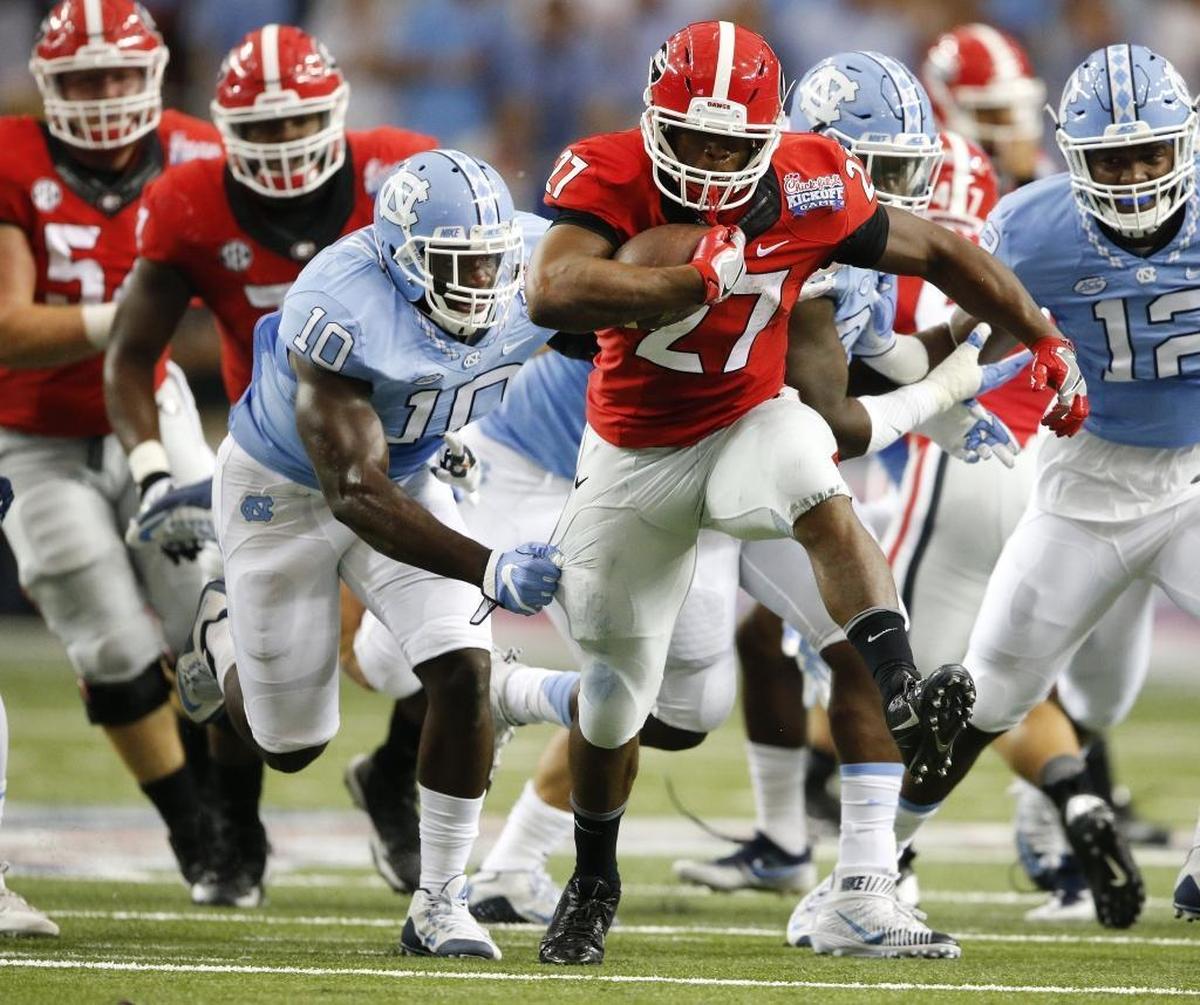 Georgia running back Nick Chubb (27) is the bigger of Georgia’s two backs and could be available on Day 2 of the draft, when the Carolina Panthers are more likely to pounce.