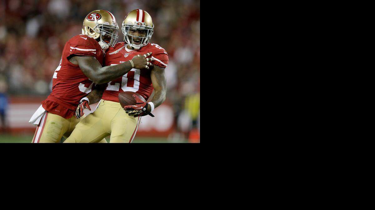 
San Francisco defensive back Perrish Cox (20) could be the guy the Carolina Panthers wanted Antoine Cason to be last year. He stands to make more than $1 million next season, and his ability to return punts will interest a Panthers team still trying to figure out that special teams position.
