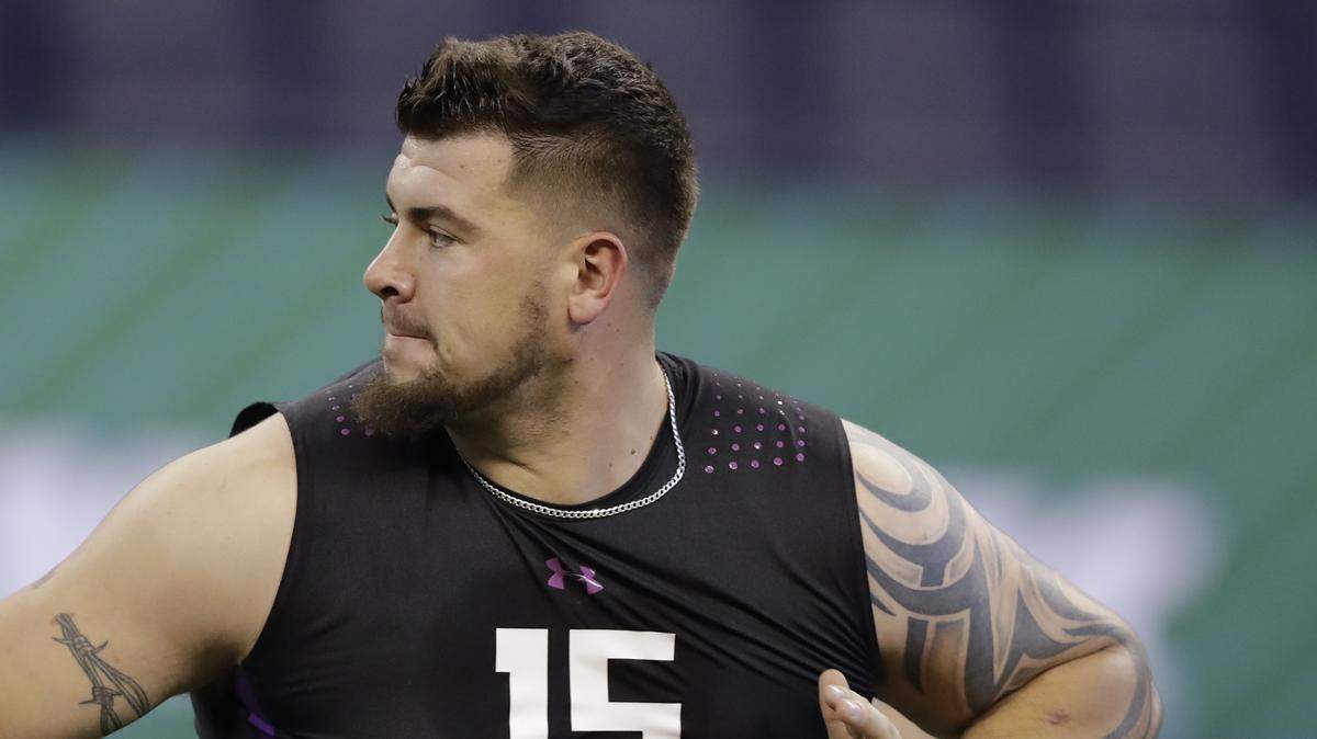 Clemson offensive lineman Taylor Hearn runs a drill during the NFL football scouting combine, Friday, March 2, 2018, in Indianapolis. (AP Photo/Darron Cummings)