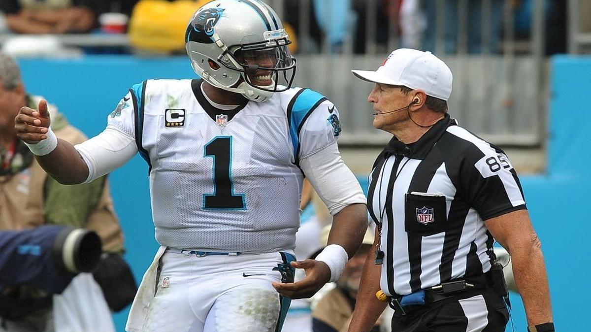 
Carolina Panthers quarterback Cam Newton talks to referee Ed Hochuli after a no call on his being hit late and out of bounds by New Orleans Saints defensive tackle Tyeler Davison during fourth quarter action on Sunday. The Panthers defeated the Saints 27-22.
