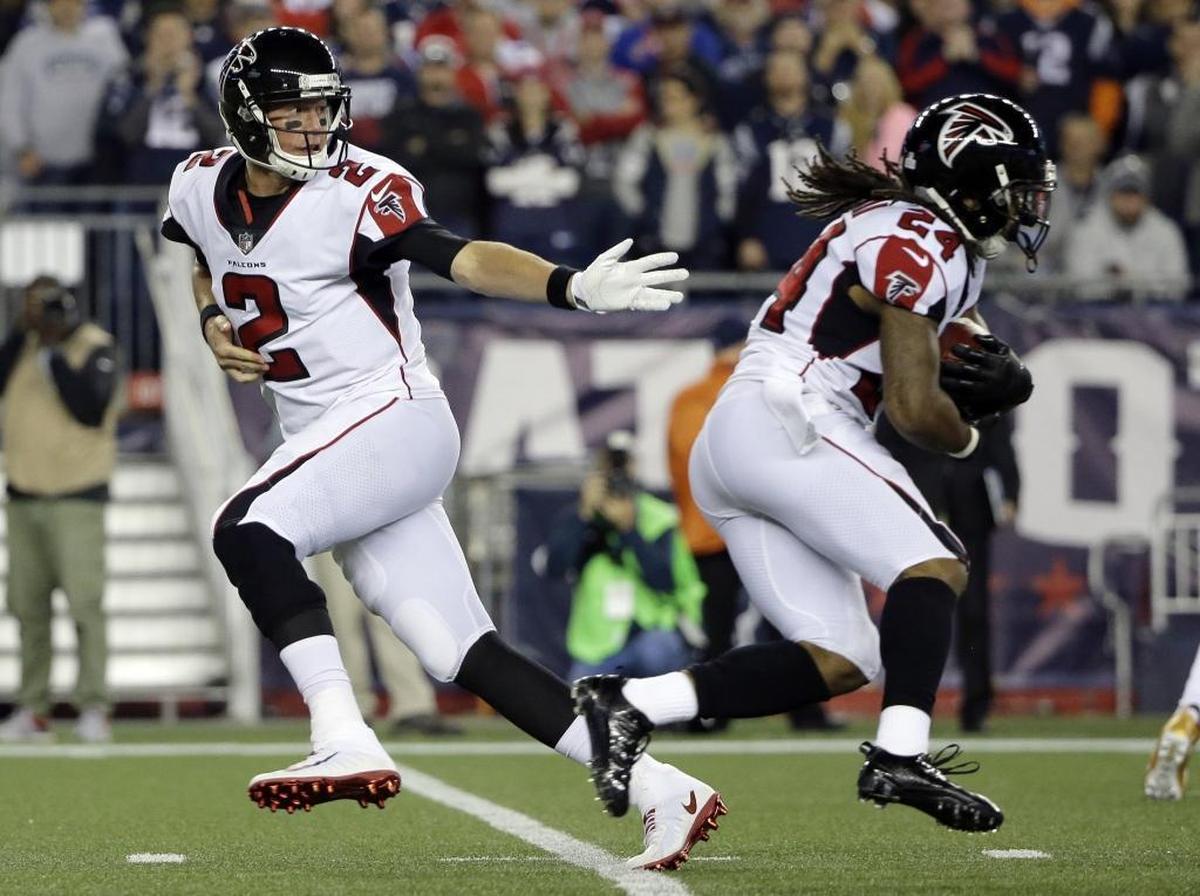 Atlanta Falcons quarterback Matt Ryan, left, handing off to running back Devonta Freeman hasn’t been the weapon it was in 2016, but the potential is there.