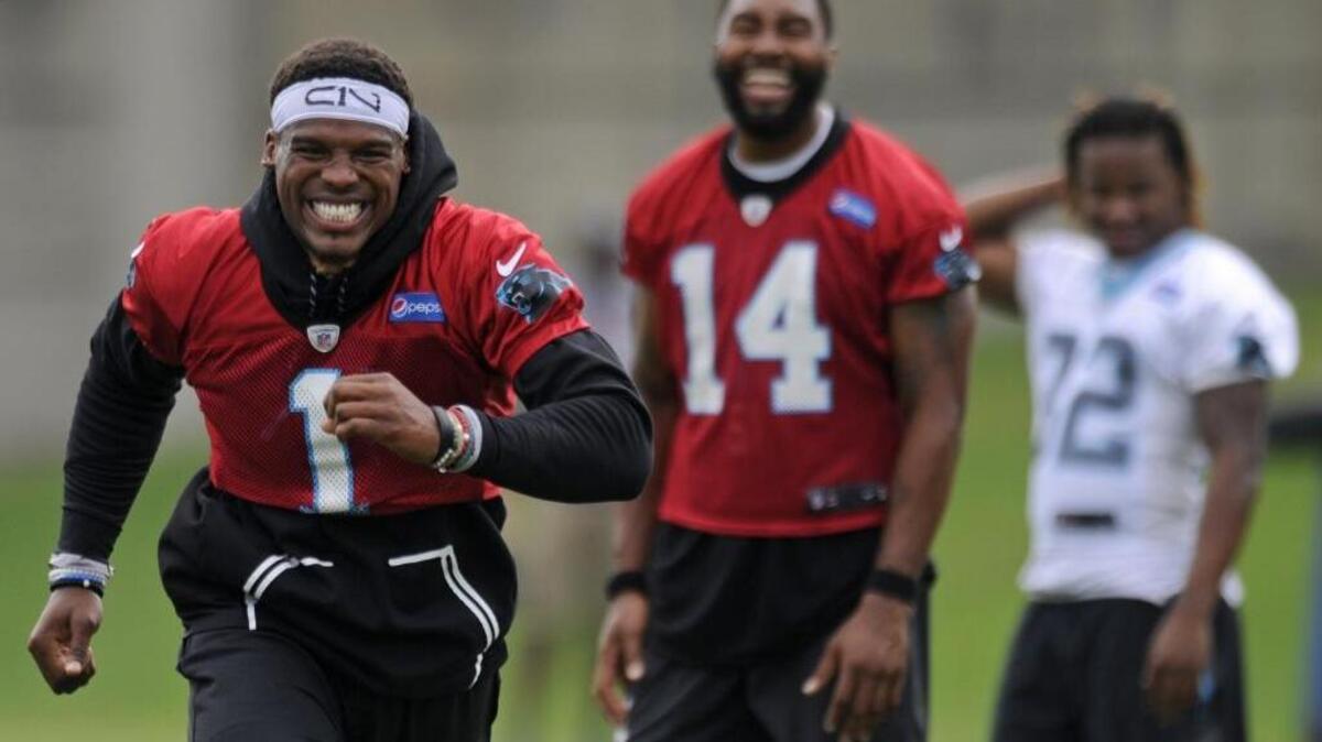 Carolina Panthers quarterback Cam Newton (1) has some fun during practice on the last day of mini-camp on Thursday. Newton did not throw. The Carolina Panthers held their last day of mini-camp on Thursday.