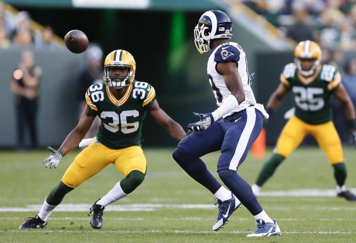 Green Bay Packers' LaDarius Gunter intercepts a pass during the first half of a preseason NFL football game against the Los Angeles Rams Thursday, Aug. 31, 2017, in Green Bay, Wis. (AP Photo/Matt Ludtke)