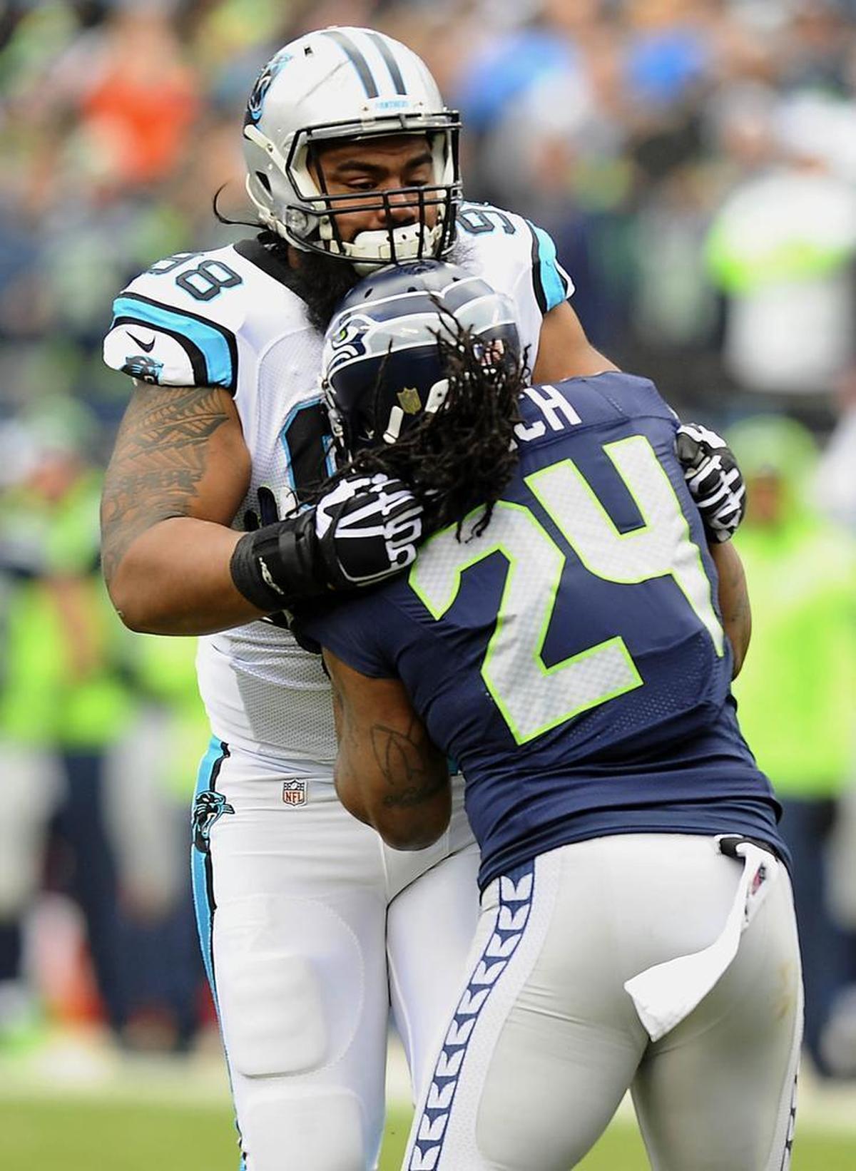 Star Lotulelei, left, has been a team-oriented guy from the moment he arrived from Utah after he was drafted 14th overall in 2013.