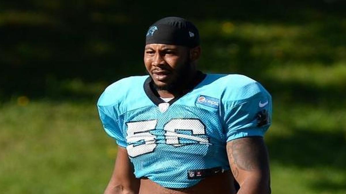 Carolina Panthers linebacker Zeek Bigger, left, walks to practice with head coach Ron Rivera, right, on Tuesday, August 1, 2017 at Wofford College in Spartanburg, SC.