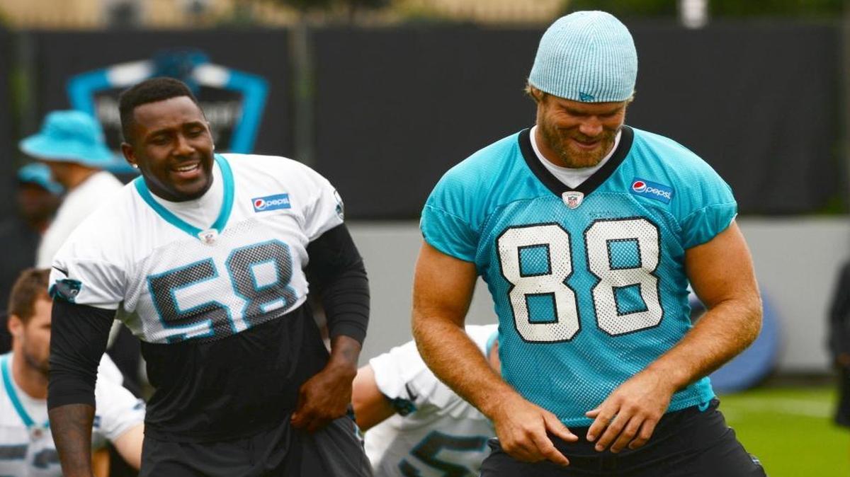 Thomas Davis (58) and Greg Olsen (88) are team captains and locker room leaders for the Carolina Panthers. Could their contract demands be the reason the team fired general manager Dave Gettleman on Monday?