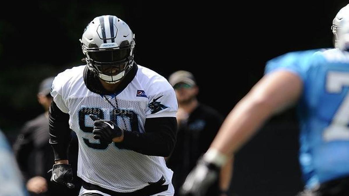 Carolina Panthers defensive end Julius Peppers (90) says his return to the Carolina Panthers has “been nice. The reception has been very warm. I have a lot of familiarity with the team, the building. I’m at home, I feel comfortable.”