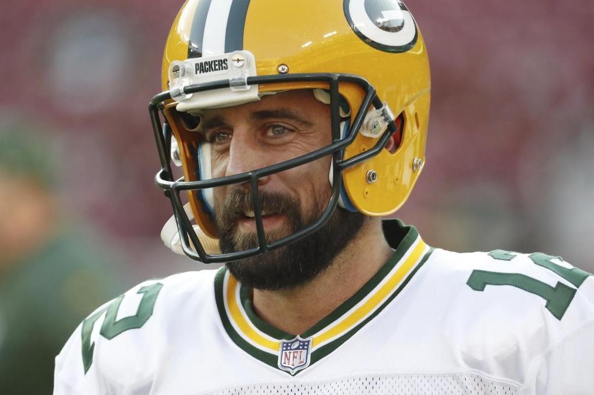 Green Bay Packers quarterback Aaron Rodgers (12).