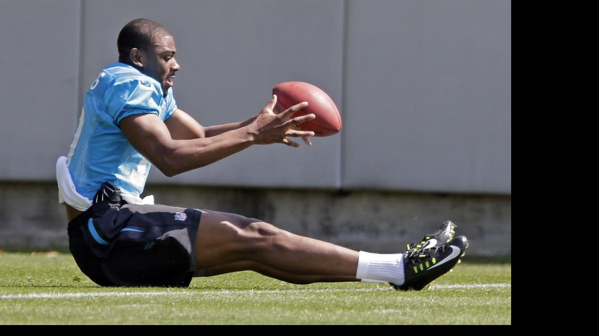 
Carolina Panthers wide receiver Devin Funchess (17) reaches for a ball during a practice at the rookie minicamp in Charlotte on May 8. 
