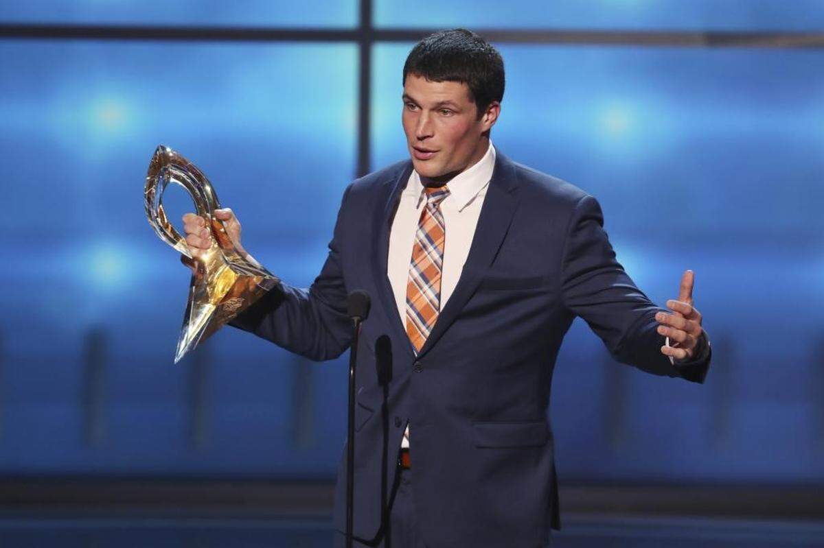 Carolina Panthers linebacker Luke Kuechly accepts the Art Rooney Sportsmanship Award at Saturday’s 7th Annual NFL Honors event in Minneapolis.