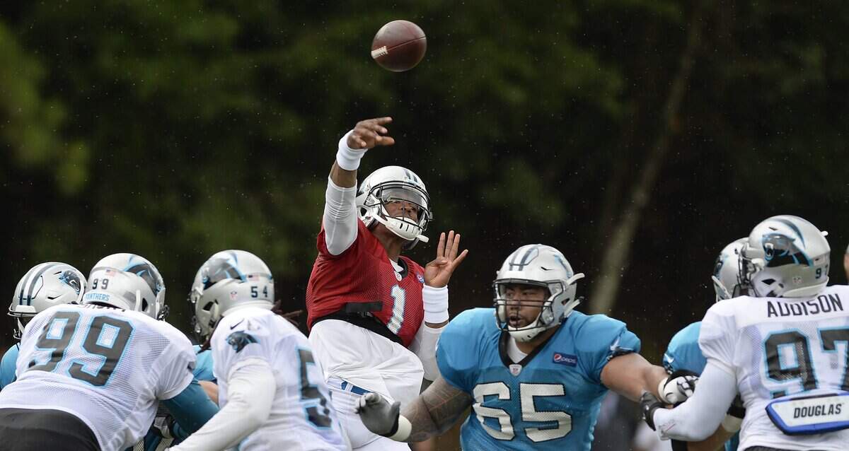 Carolina Panthers quarterback Cam Newton (1) throws downfield during practice at training camp at Wofford College in Spartanburg, SC on Thursday, August 2, 2018.