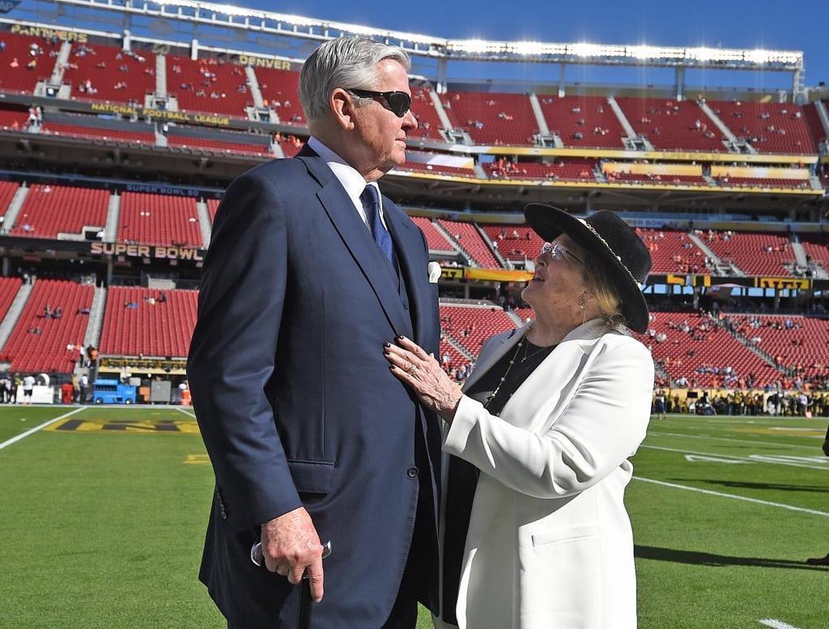 Jerry Richardson and his wife Rosalind take to the field at Levi's Stadium in Santa Clara, Calif., for Super Bowl 50 Sunday, February 7, 2016. “You would think he was a retired general … from the demeanor and disciplined approach from everything from dress to posture to business,” says Max Muhleman, who helped Richardson build a stadium as architect of permanent seat licenses – the fees paid for the right to buy seats.