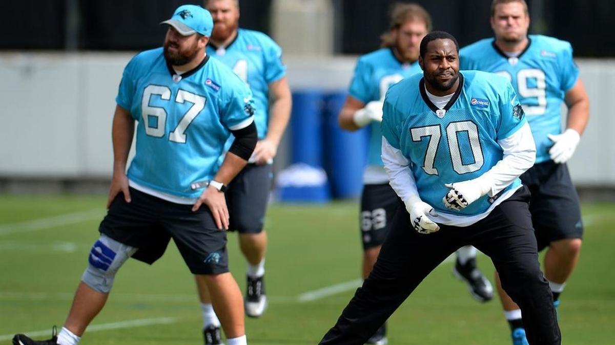 Carolina Panthers guard Trai Turner, right, and center Ryan Kalil, left, stretch during a practice in October 2016. Turner was in the concussion protocol following Carolina’s Week 14 win against Minnesota, but has been cleared in time for Sunday’s wild-card game in New Orleans.