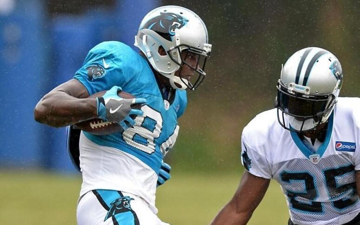 Statistically, Carolina Panthers tight end Ed Dickson, left, has had the two least-productive seasons of his career in his two years with the team. But numbers alone aren’t his goal.