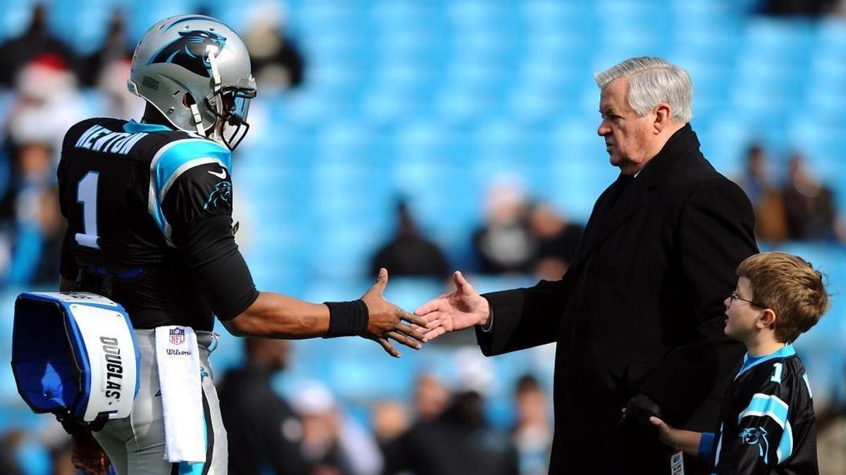 Carolina Panthers quarterback Cam Newton, left, greets owner Jerry Richardson prior to a game against the Oakland Raiders at Bank of America Stadium in 2012. The pending sale of the Panthers will a test of the value of NFL franchises.