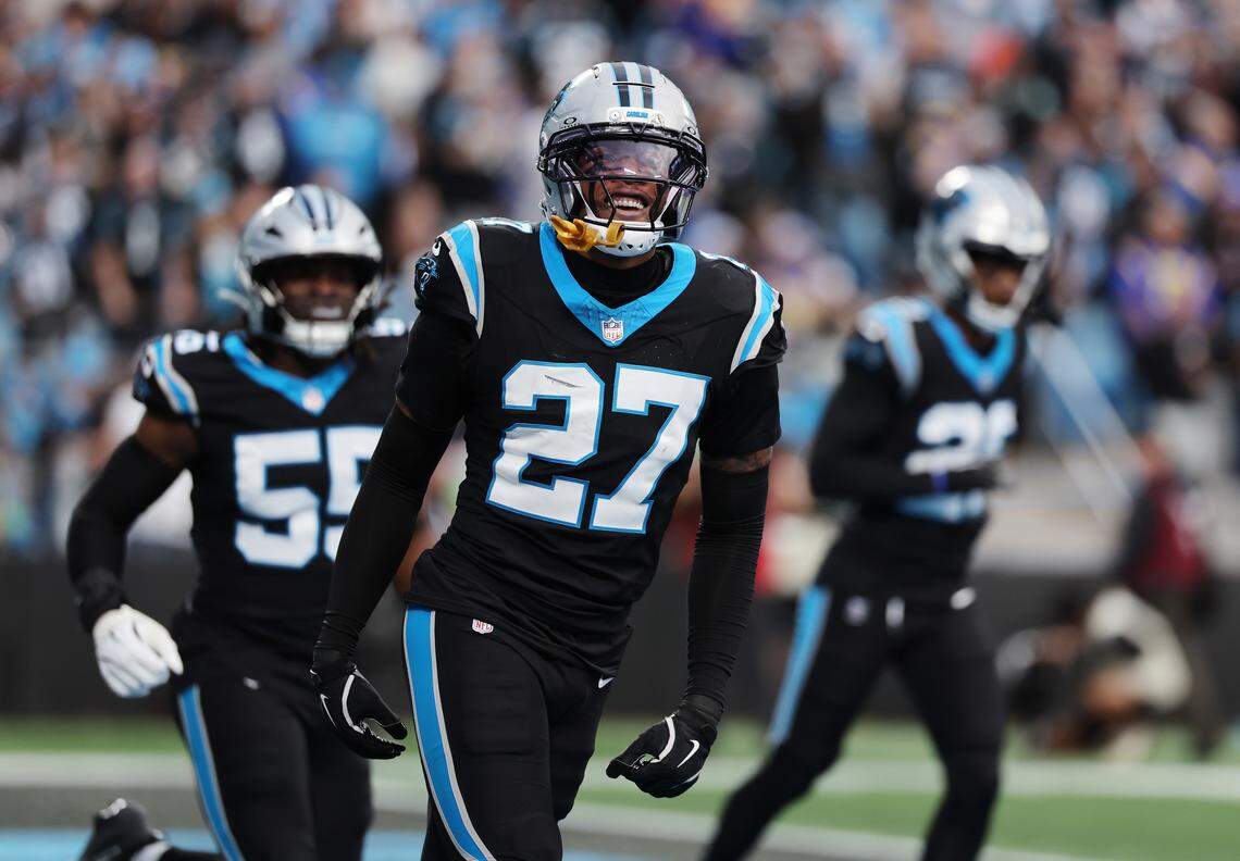 Carolina Panthers safety Isaiah Simmons smiles at the crowd after a play during a wild-card playoff game against the Los Angeles Rams on Jan. 10, 2026, at Bank of America Stadium.