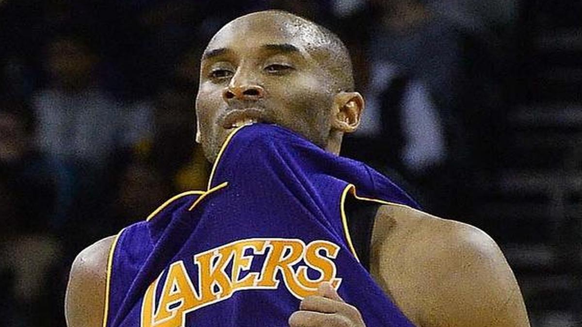 Los Angeles Lakers guard Kobe Bryant (24) played his final NBA game in Charlotte on Monday, and afterward took time to talk to Roman Harper and other Panthers players.