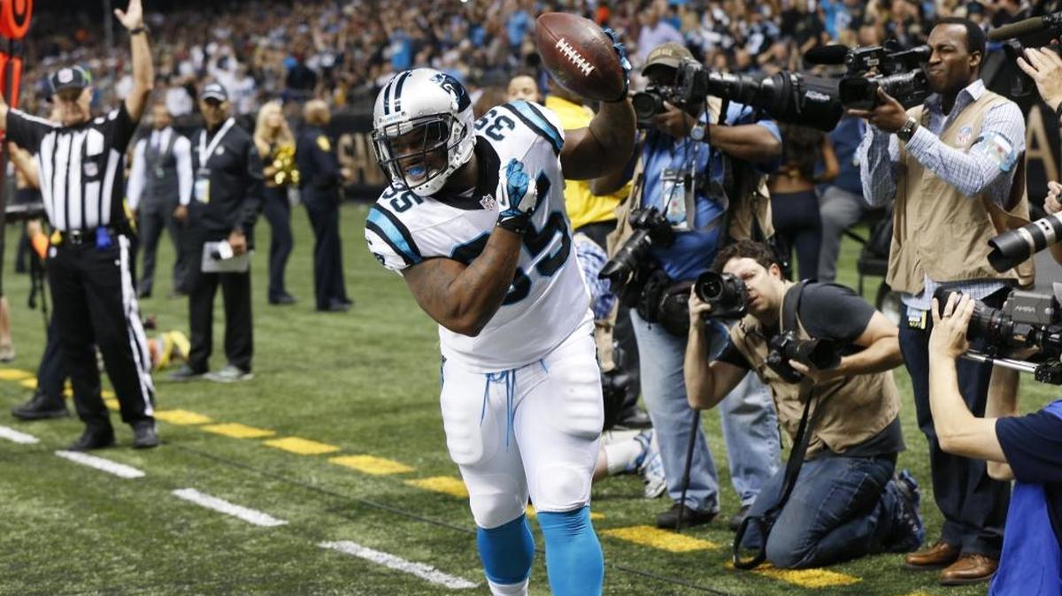 Carolina Panthers fullback Mike Tolbert celebrates his touchdown against New Orleans with the Carlton, a dance made popular on the TV show “The Fresh Prince of Bel-Air.”