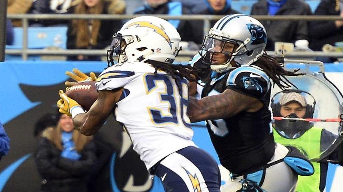 San Diego Chargers cornerback Trovon Reed (38) intercepts a pass intended for Carolina Panthers wide receiver Kelvin Benjamin at the goal line in the fourth quarter on Sunday. The Panthers won, 28-16.