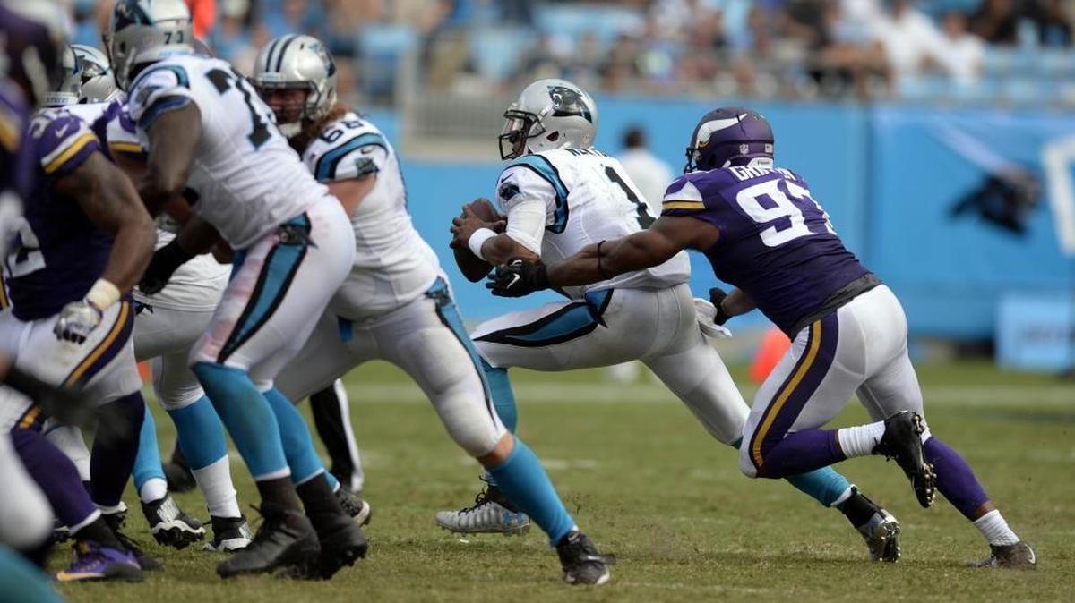 Minnesota Vikings defensive end Everson Griffen (97) closes in on Carolina Panthers quarterback Cam Newton (1) in the second half of Sunday’s game at Bank of America Stadium. The Vikings won, 22-10.