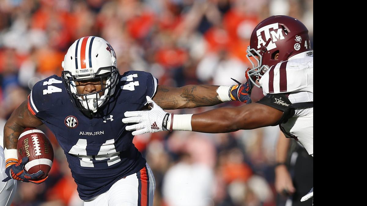 
Auburn running back Cameron Artis-Payne (44) led the SEC in rushing last season with 1,608 yards and 13 touchdowns. 
