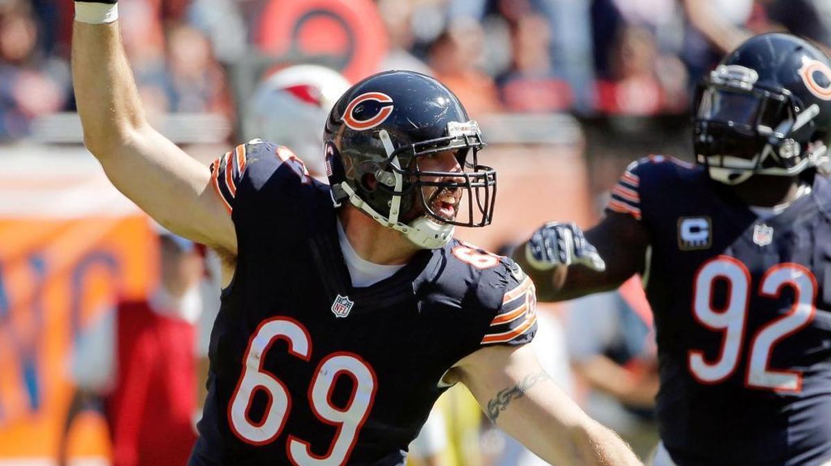 
Jared Allen (left) celebrates with Chicago Bears teammates after making an interception against the Arizona Cardinals earlier this season. Monday, Allen was acquired by the Carolina Panthers and will practice for the first time with his new team on Wednesday.
