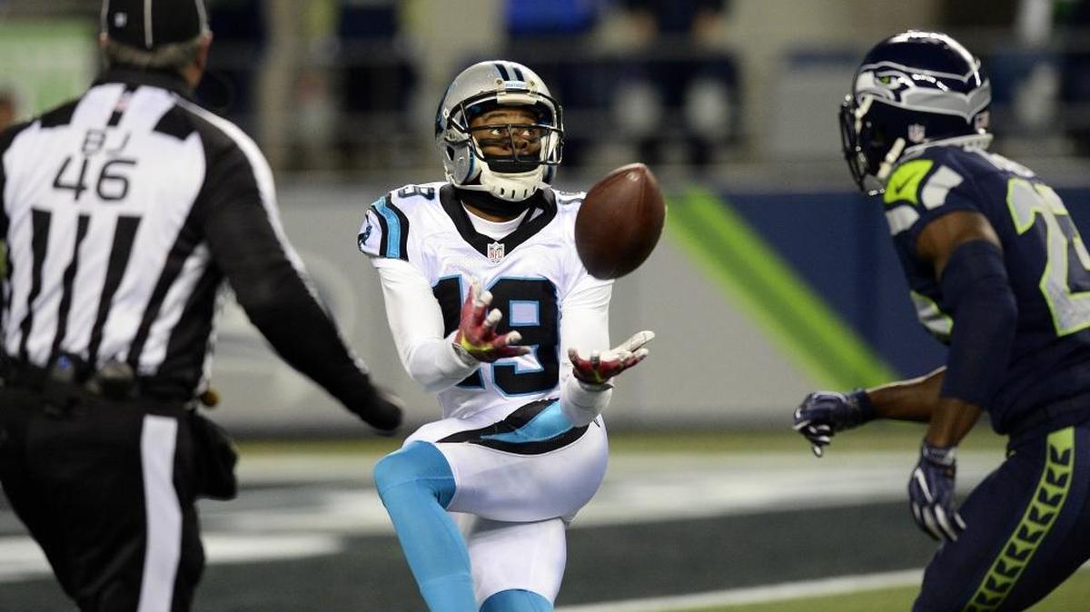 Carolina Panthers wide receiver Ted Ginn Jr. hauls in a touchdown pass against Seattle Seahawks free safety Steven Terrell during the first half Sunday at CenturyLink Field in Seattle.