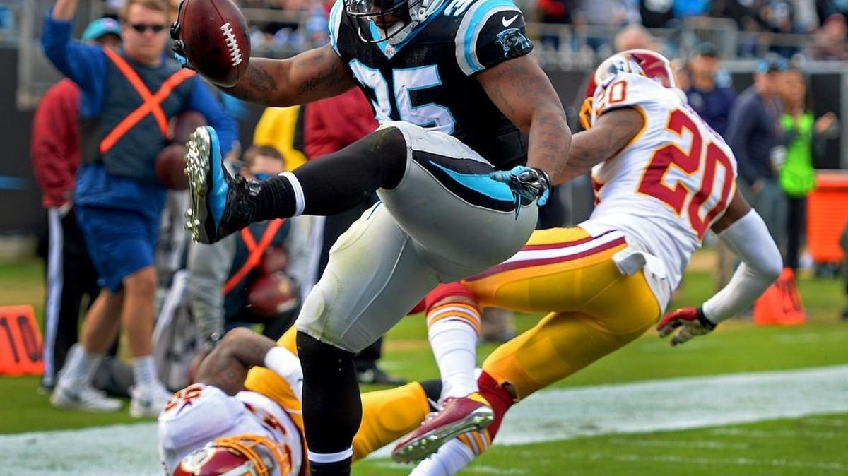 Carolina Panthers full back Mike Tolbert high steps into the end zone for a touchdown vs Washington during first quarter action at Bank of America Stadium in Charlotte, NC on Sunday, November 22, 2015.