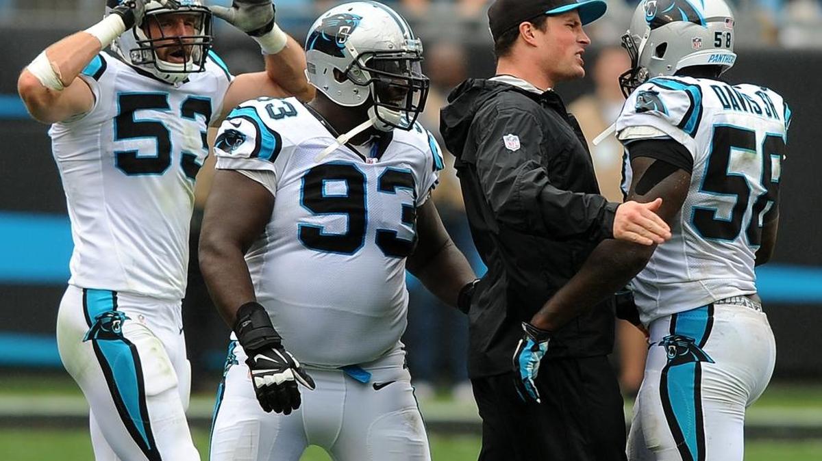 
(L-R) Carolina Panthers linebacker Ben Jacobs, defensive tackle Kyle Love, linebacker Luke Kuechly congratulate linebacker Thomas Davis on a play vs the New Orleans Saints September 27, 2015 at Bank of America Stadium in Charlotte. Kuechly may return to action after the bye week.
