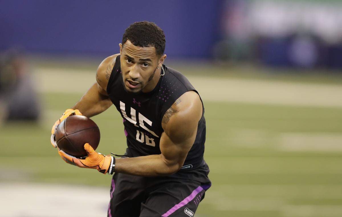 Wake Forest defensive back Jessie Bates runs a drill during the NFL football scouting combine, Monday, March 5, 2018, in Indianapolis. (AP Photo/Darron Cummings)