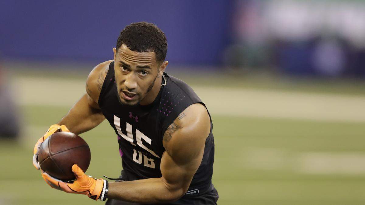 Wake Forest defensive back Jessie Bates runs a drill during the NFL football scouting combine, Monday, March 5, 2018, in Indianapolis. (AP Photo/Darron Cummings)