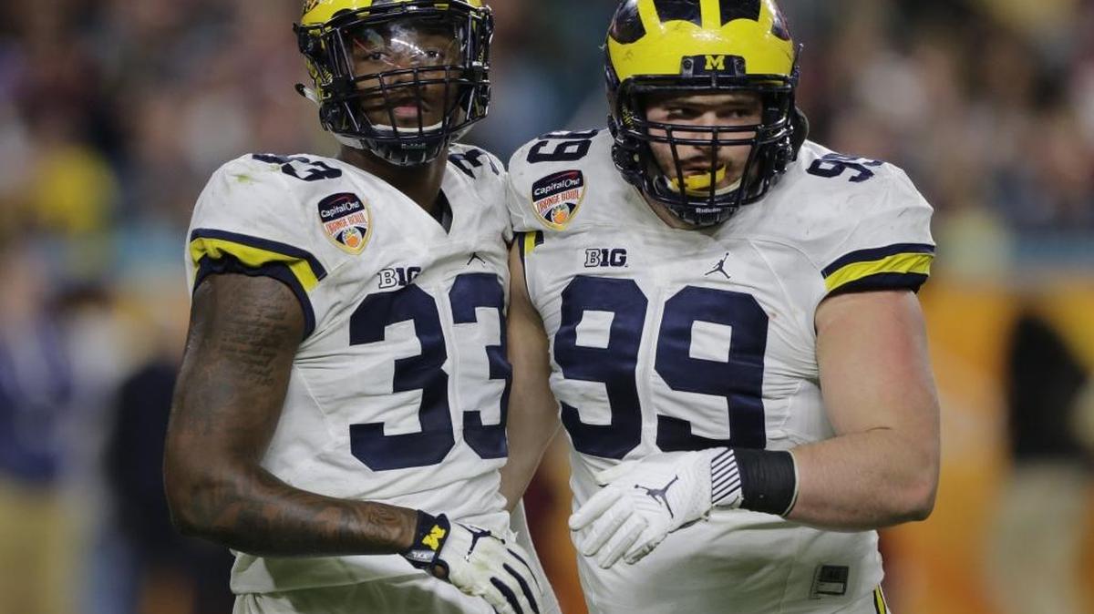 Michigan defensive end Taco Charlton (33) impressed in his only year as a starter for the Wolverines.