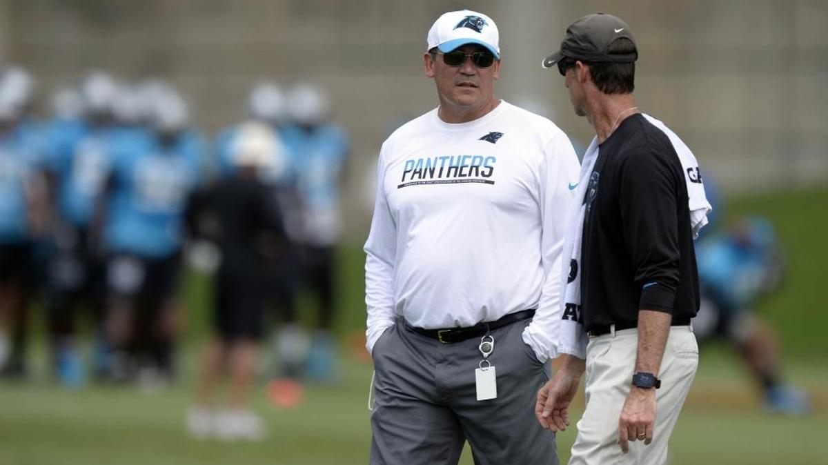 Carolina Panthers coach Ron Rivera, left, says he would rather not open the season with a Super Bowl rematch on the road. For one thing, the Thursday opener takes away preparation time. It also denies his team a home opener to celebrate its NFC championship.